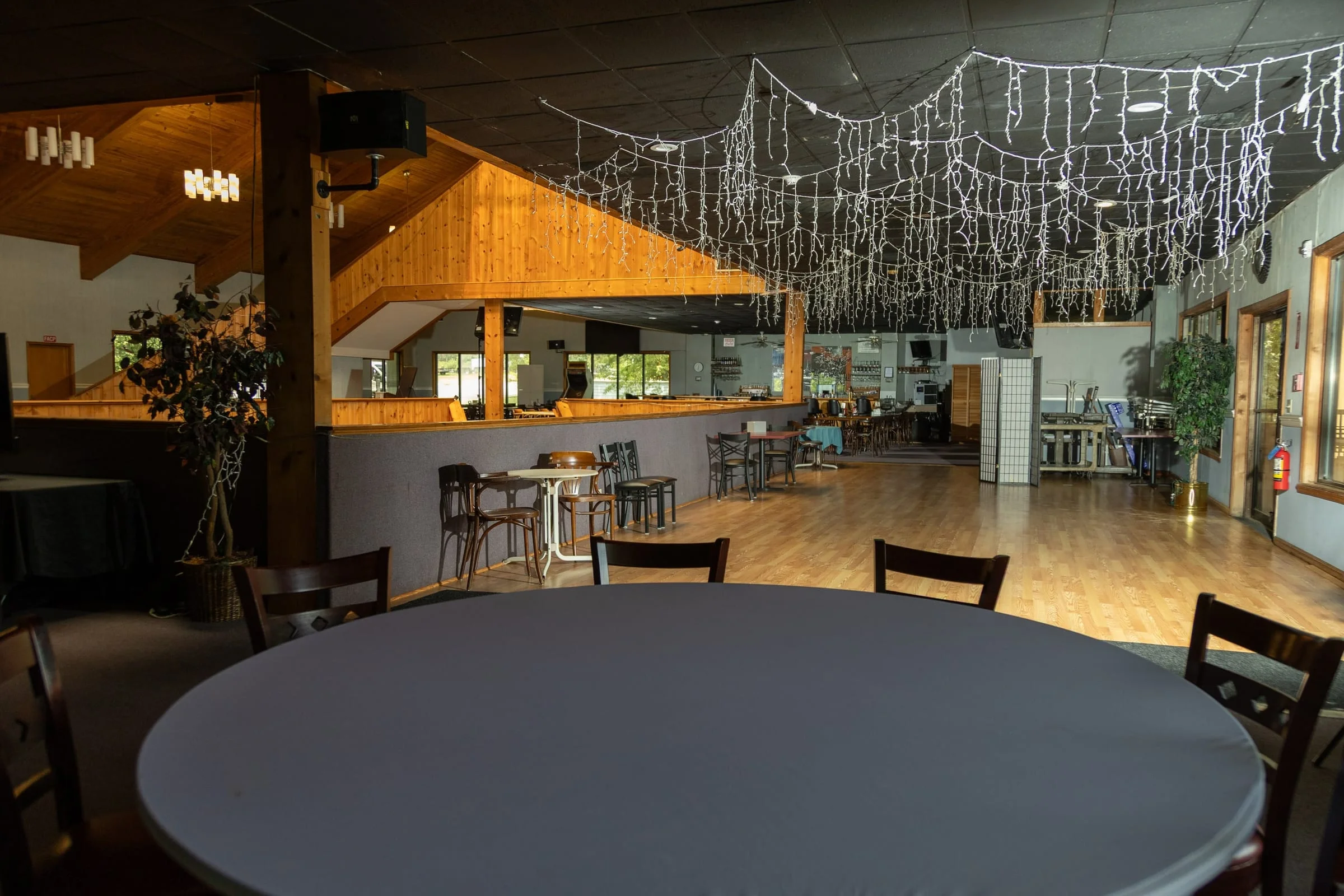 Dance floor under icicle lights in the event hall